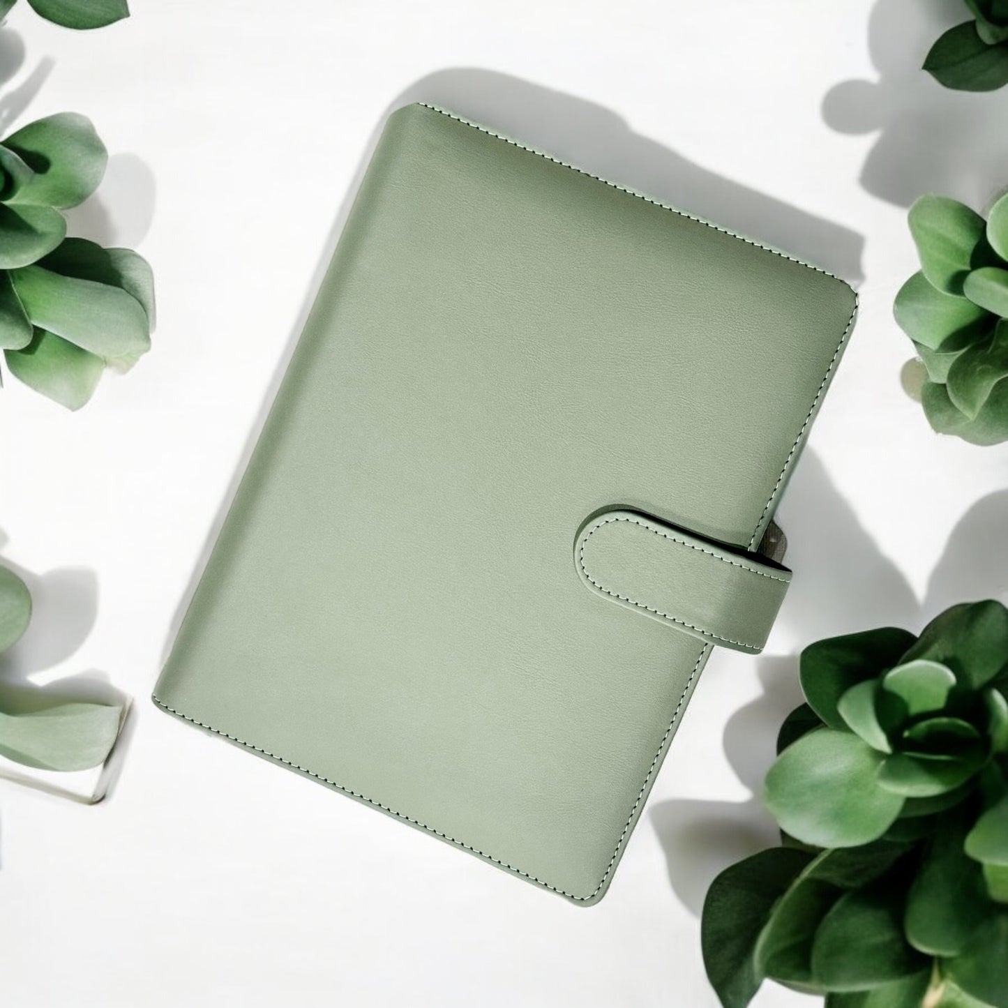 The sage green journal cover